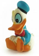 Donald Duck cheerful sitting squeaky figure 11cm