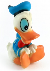 Donald Duck cheerful sitting squeaky figure 11cm