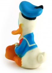 Donald Duck cheerful sitting squeaky figure 11cm