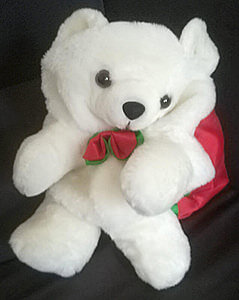 Plush teddy bear with Christmas rucksack